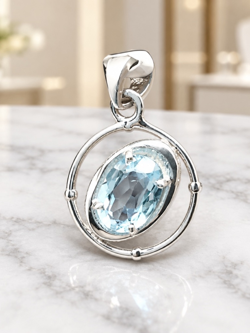 Sterling Silver Swiss Blue Topaz Oval Pendant